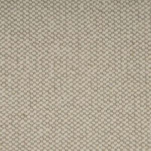 Close-up of textured light beige loop-pile carpet